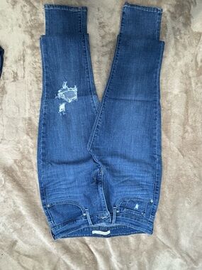 Levi's High-Rise Distressed Jeans in Dark Blue